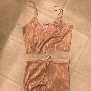 Rose gold glittery pajama set.